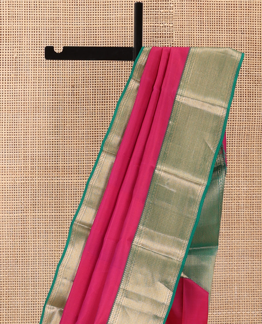 Red plain Kanchipuram silk saree, contrast border of thilakam, banaras, kuyil kann, and rudraksham designs, and jaal pallu