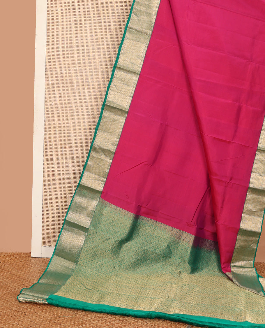 Red plain Kanchipuram silk saree, contrast border of thilakam, banaras, kuyil kann, and rudraksham designs, and jaal pallu