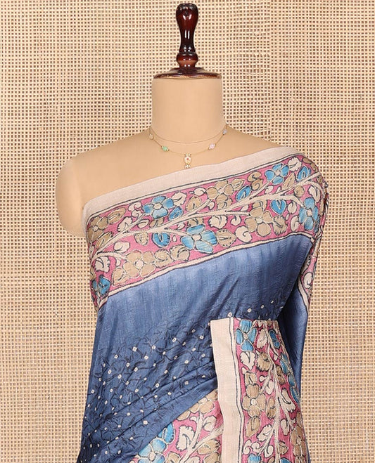 Blue Semi-Tussar Saree Meticulously Designed in Bandhani Dots, Complemented by a Contrast Kalamkari Floral Creeper Printed with Kantha Work Border, Pallu Featuring Floral Print Kantha Work, and Paired with a Contrast Printed Blouse