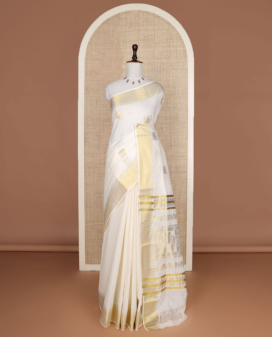 Cream zari buttas Kerala saree, temple zari border, and pallu of intricate zari designs