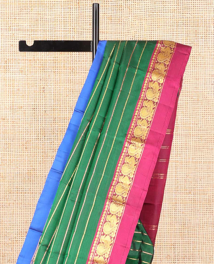 Green striped kancheepuram silk saree with contrast ganga jamuna border of paisley, mayil design & zari design pallu