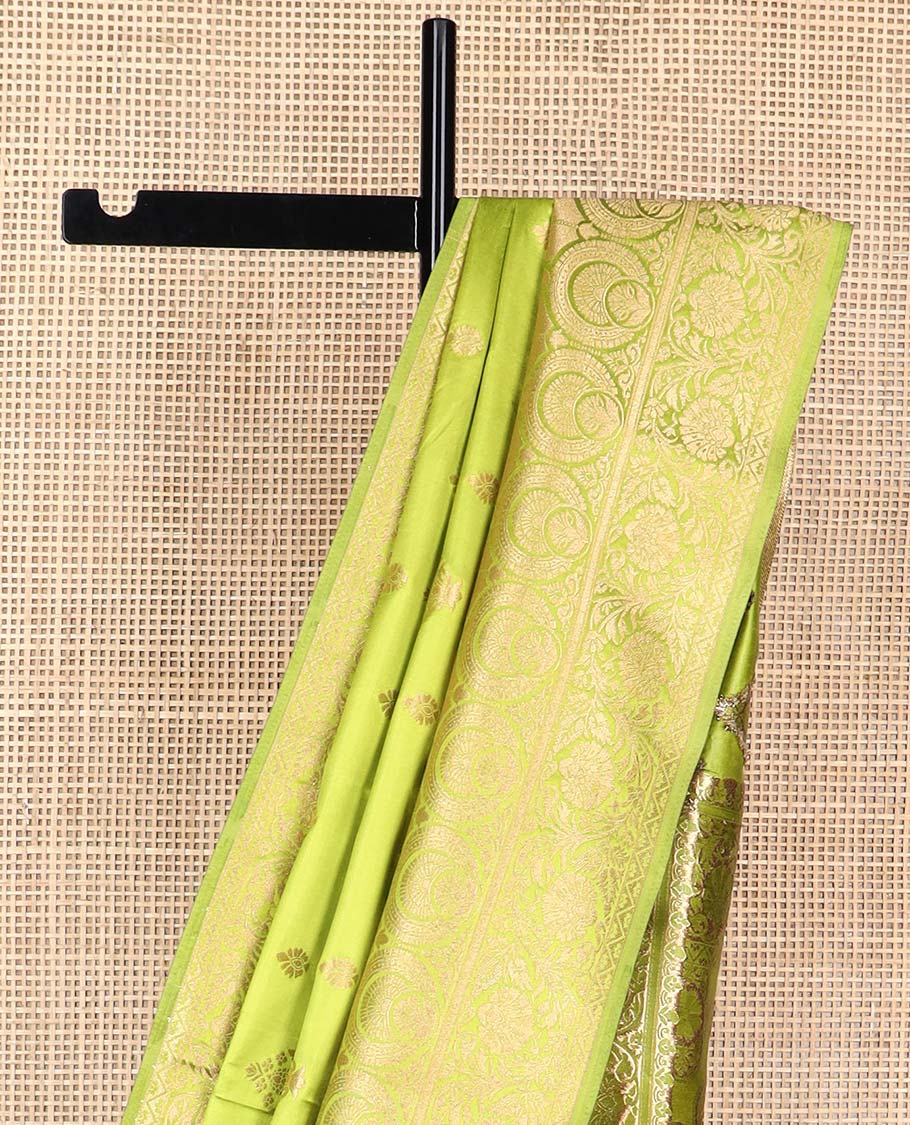 Green floral motifs mushru silk saree with self floral design border & floral design pallu