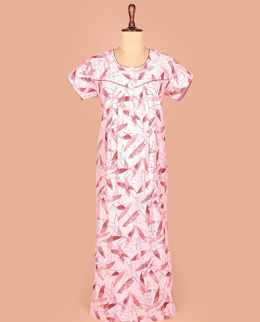 Pale Pink Cotton Nighty Adorned with Geometric Patterns Print, Featuring Neck Lace Work, Round Front Neck, and Half-Sleeves