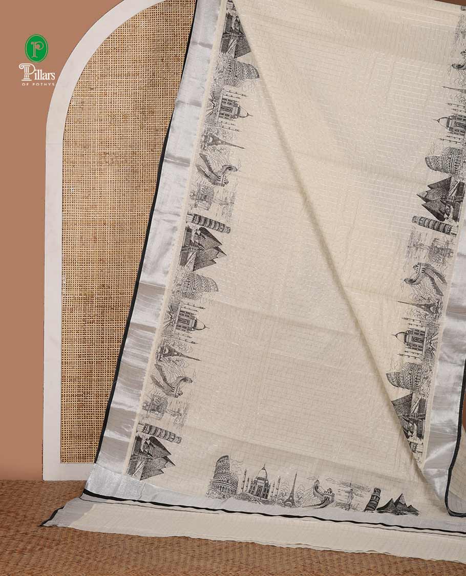 Half-white zari checked Kerala saree,bavanji border & pallu delicately printed with 7-wonders of the world motifs, zari design blouse