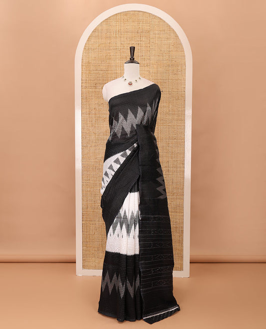 Borderless white 3-layer ikkat chevron printed litchi crushed saree, ikkat printed pallu & small butta printed black blouse