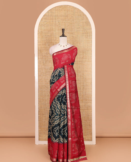Blue diamond patterns Shibori-style printed muslin cotton saree, contrast elephant motifs printed border, batik elephant motifs pallu & contrast flower buttas printed blouse