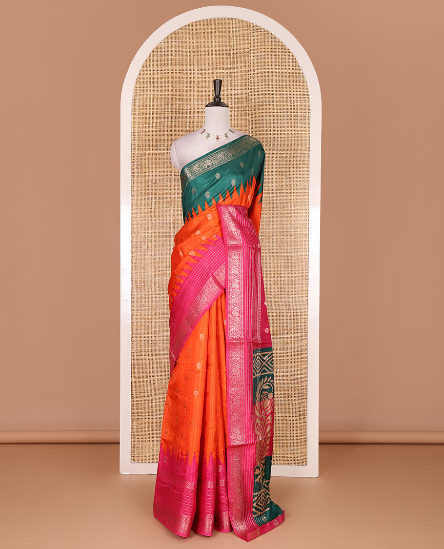 Orange zari buttas dola silk saree, contrast green-pink temple ganga jamuna traditional zari border, paisley pallu, and contrast zari design blouse