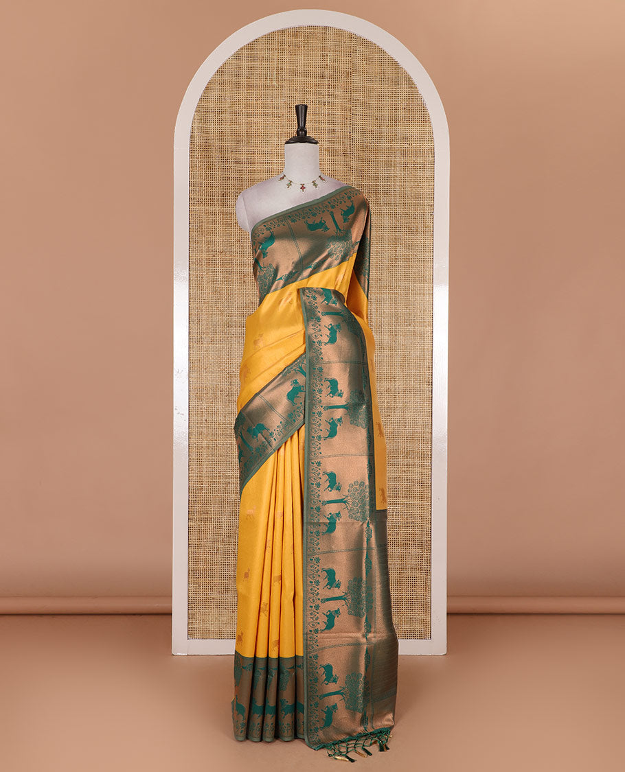 Yellow Pichwai cow zari motifs, Kanchi tissue saree, contrast Pichwai cow motifs copper zari woven border, zari-rich pallu, and contrast zari design blouse