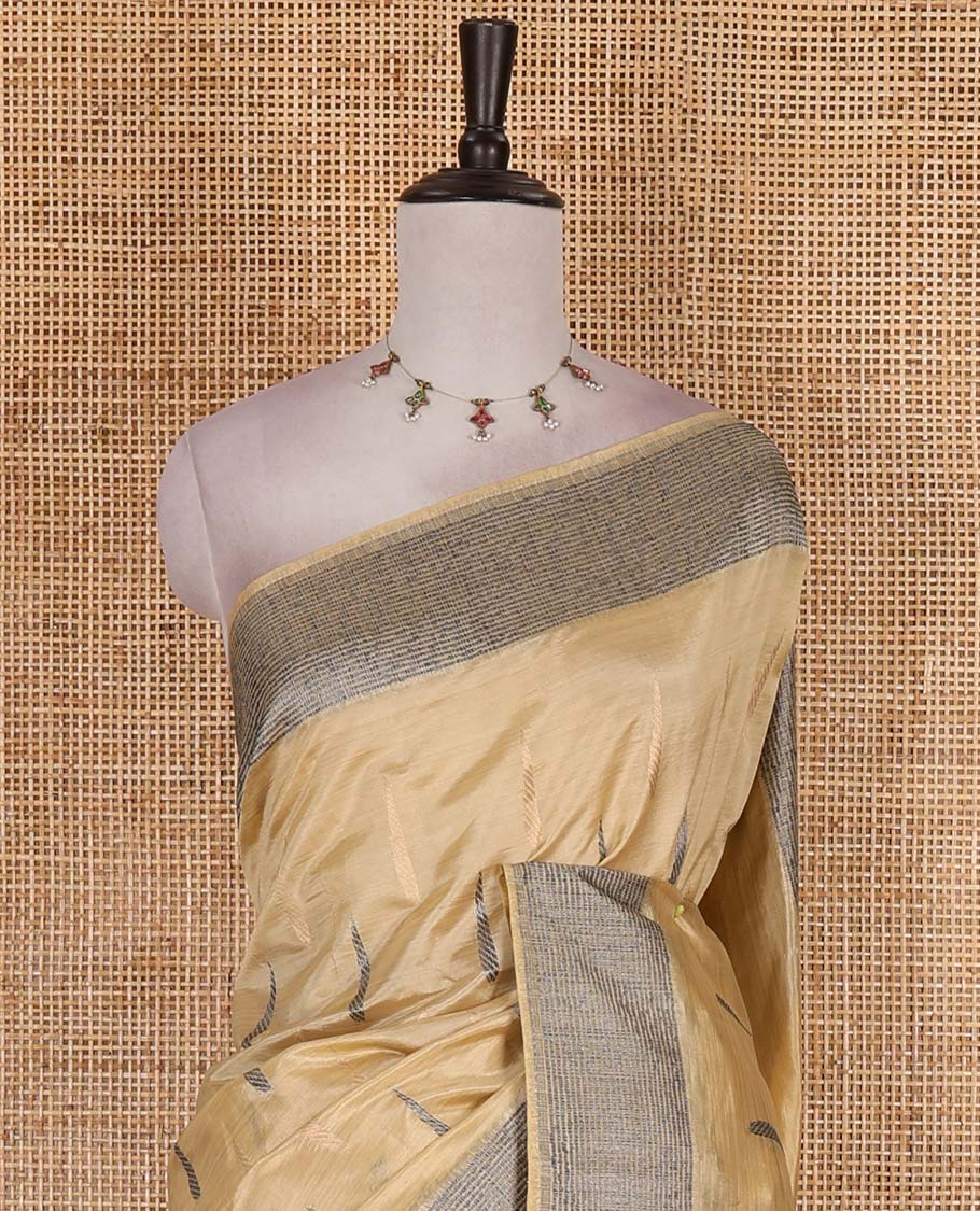 Sandal buttas woven semi-tussar saree, zari border, geometric patterned pallu, and a matching blouse