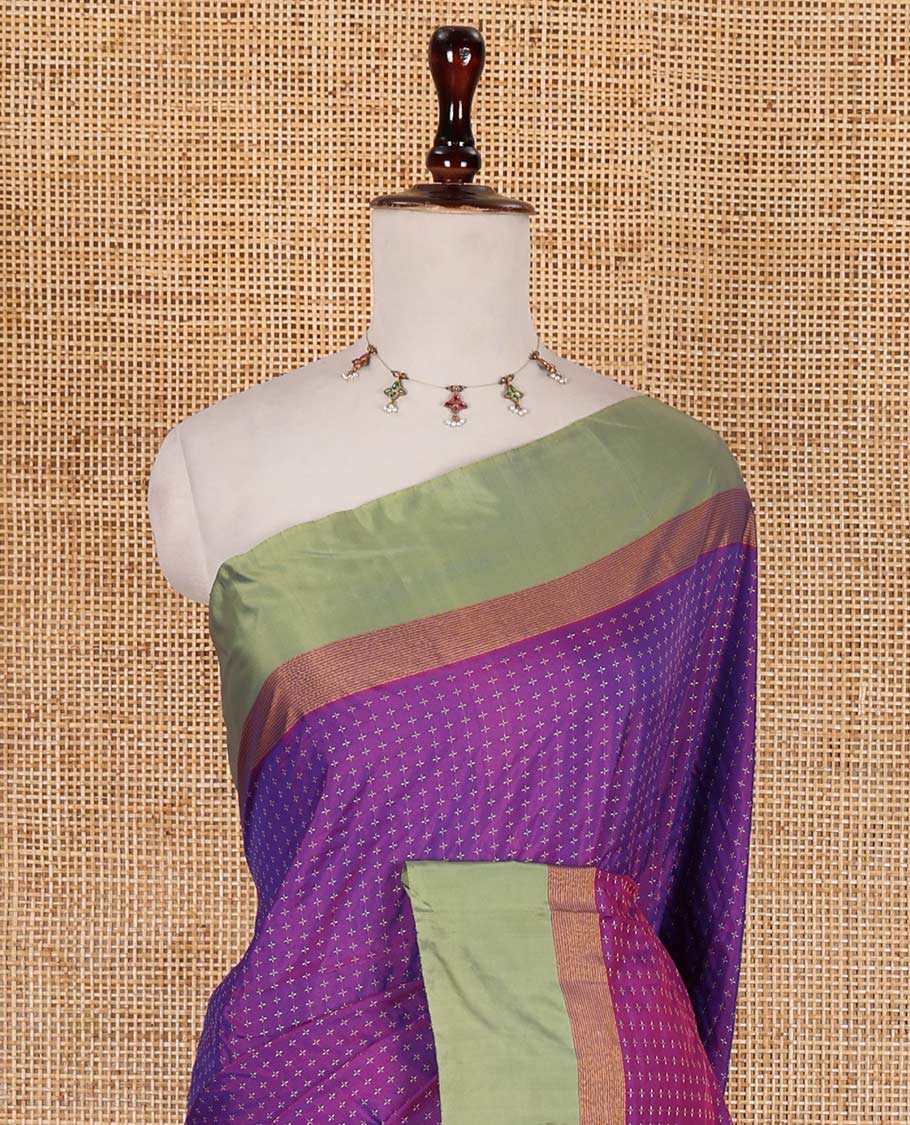 Violet-green plus-shaped buttas steeped semi-soft silk saree, contrast satin border of stripes, striped pallu, and contrast blouse