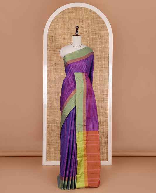 Violet-green plus-shaped buttas steeped semi-soft silk saree, contrast satin border of stripes, striped pallu, and contrast blouse