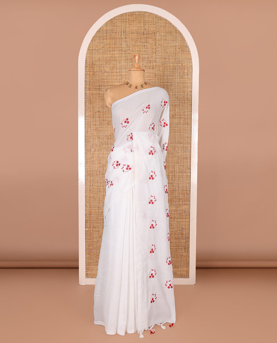 Borderless white and red floral motifs embroidered Khadi mul cotton saree with a matching plain blouse