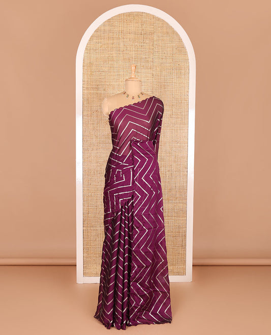 Borderless purple zig-zag stripes gold foil printed, scallop-edged rangoli chiffon saree with a matching bandhani dotted blouse