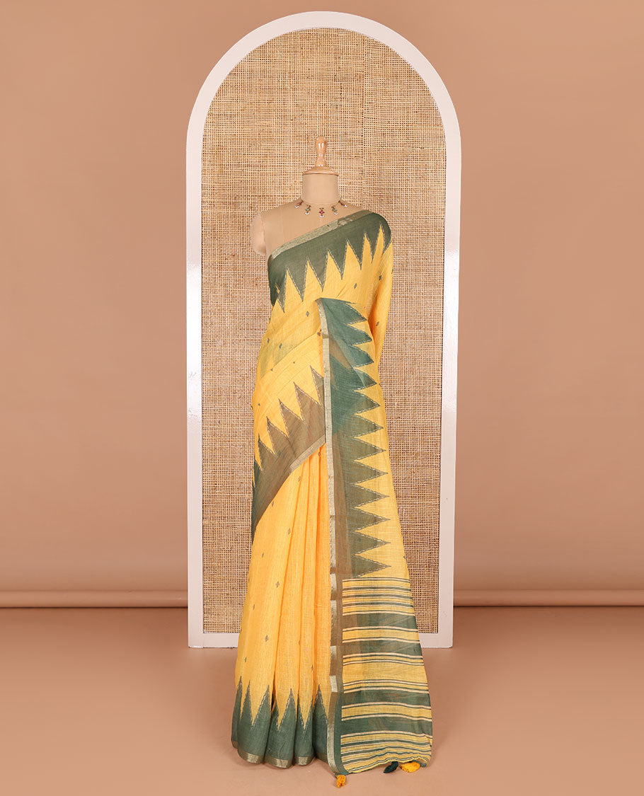 Yellow small thread buttas linen cotton saree, contrast temple zari piping border, striped pallu and a contrast blouse