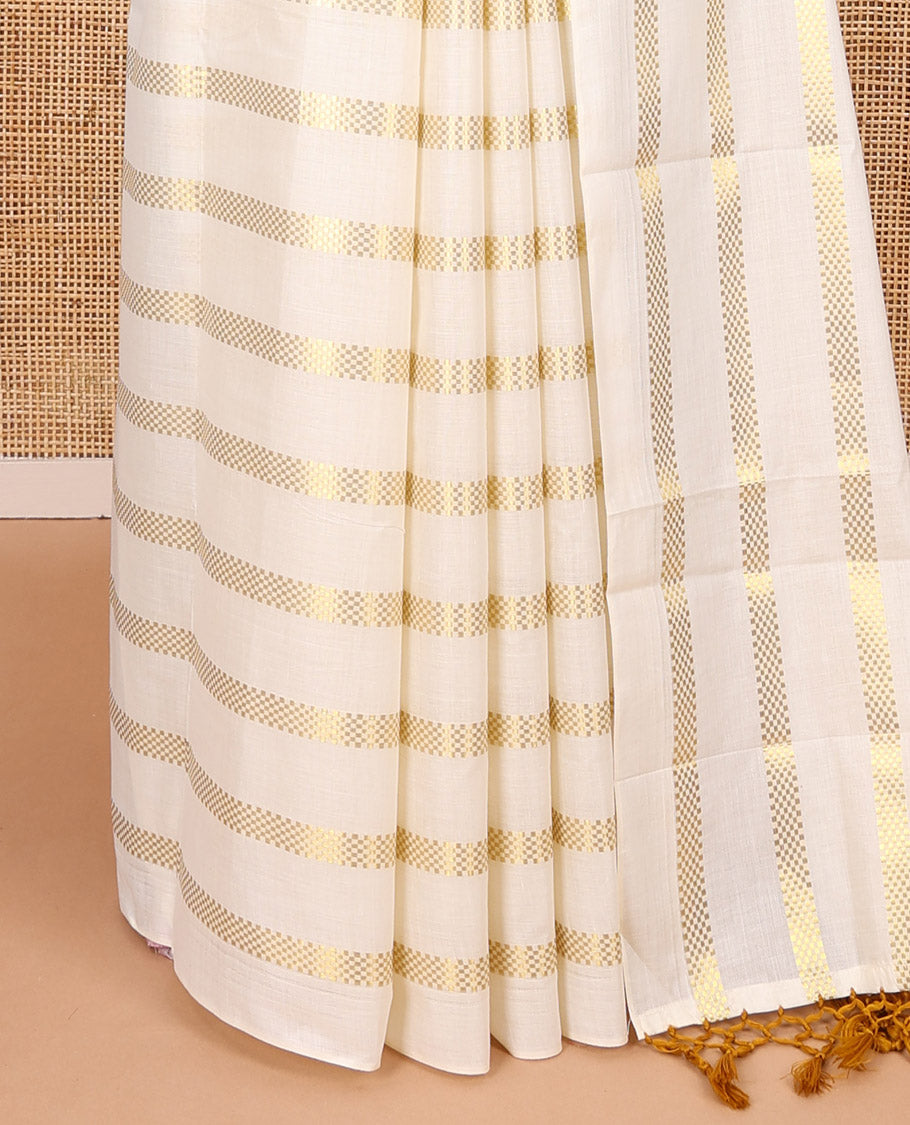Borderless cream and mustard horizontal muthu zari striped Kerala cotton saree, self-pallu with tassels, and a matching blouse