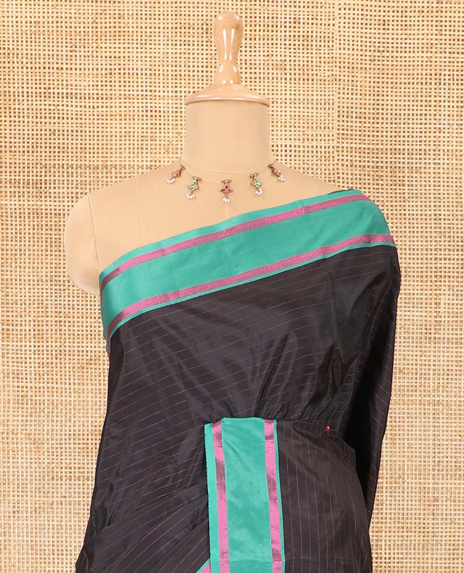 Black horizontal striped semi-soft silk saree, contrast satin striped border, striped pallu, and a matching blouse