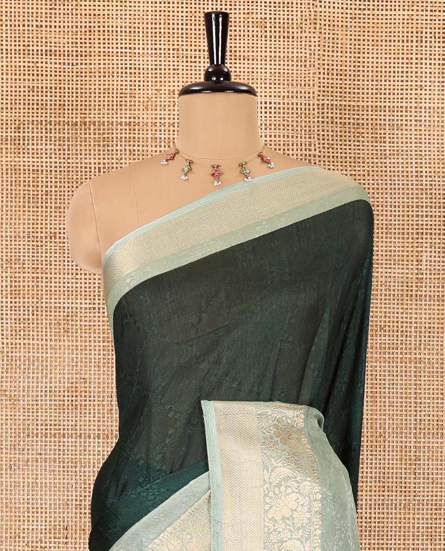 Green embossed moss chiffon saree, contrast embossed with traditional zari border, jaal pallu, and a contrast blouse