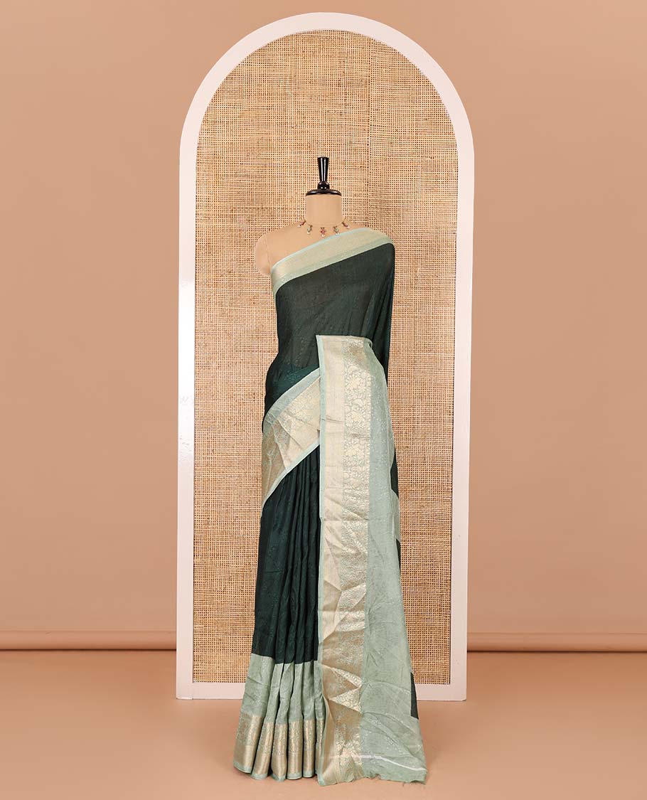 Green embossed moss chiffon saree, contrast embossed with traditional zari border, jaal pallu, and a contrast blouse