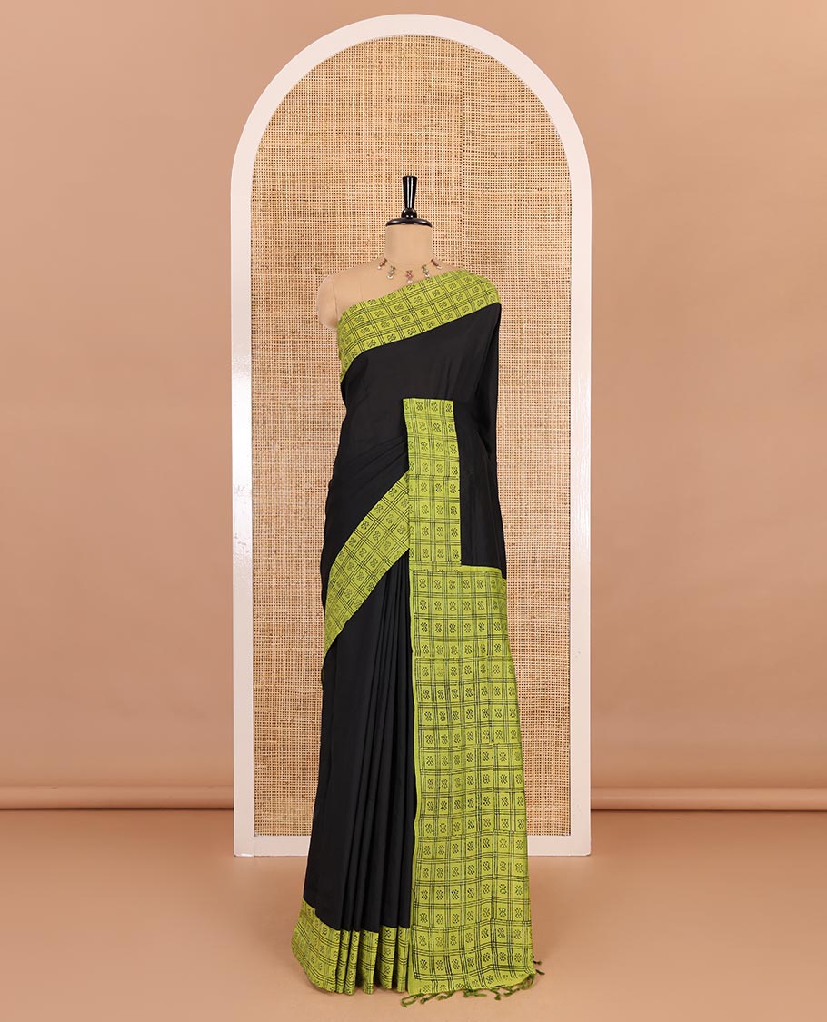 Black plain South cotton saree, contrast block printed border, and pallu of butta enclosed checks print, and block printed blouse