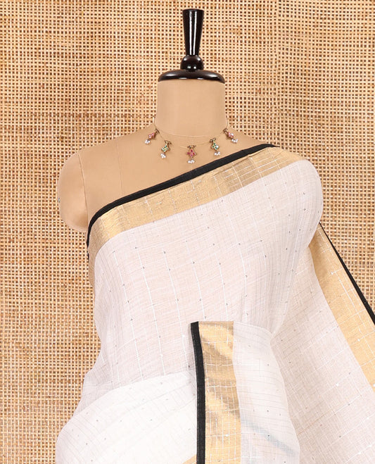 White and black sequins striped Linen cotton saree, contrast zari sequins striped border, striped pallu, and a contrast plain blouse