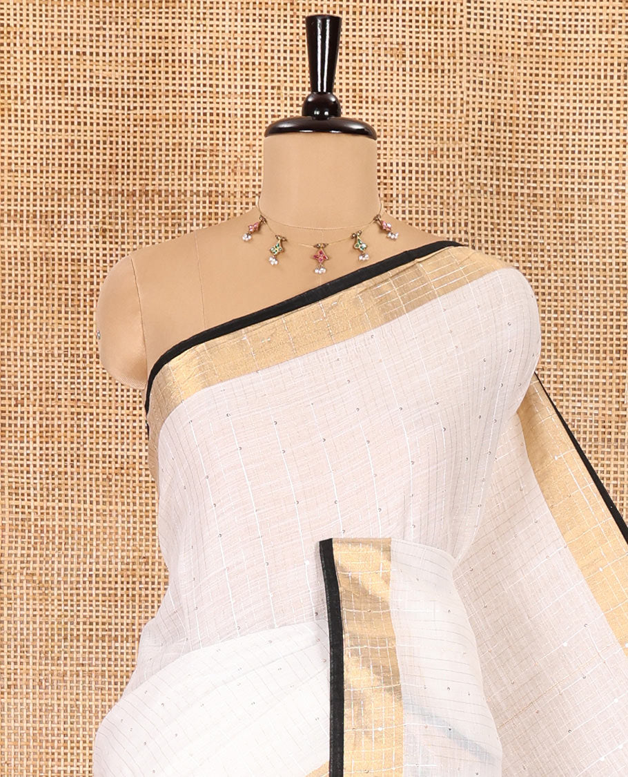White and black sequins striped Linen cotton saree, contrast zari sequins striped border, striped pallu, and a contrast plain blouse
