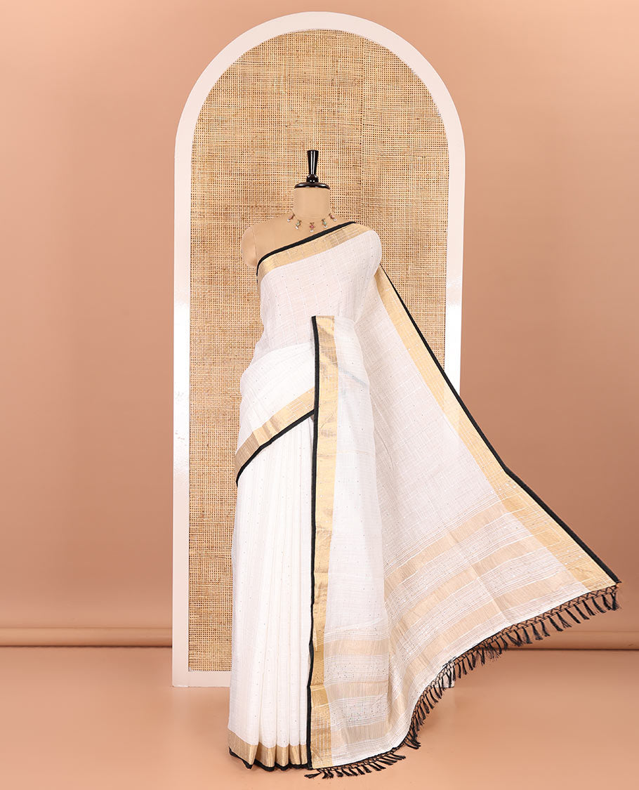 White and black sequins striped Linen cotton saree, contrast zari sequins striped border, striped pallu, and a contrast plain blouse