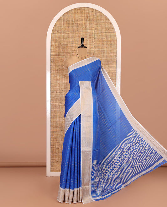 Blue horizontal striped moss chiffon saree, contrast traditional zari border, geometric patterns printed pallu, and a printed blouse