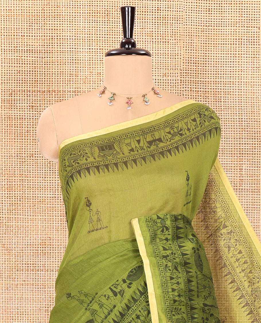 Green Warli-village printed khadi cotton saree, printed border, and contrast warli motifs printed pallu, and contrast plain blouse