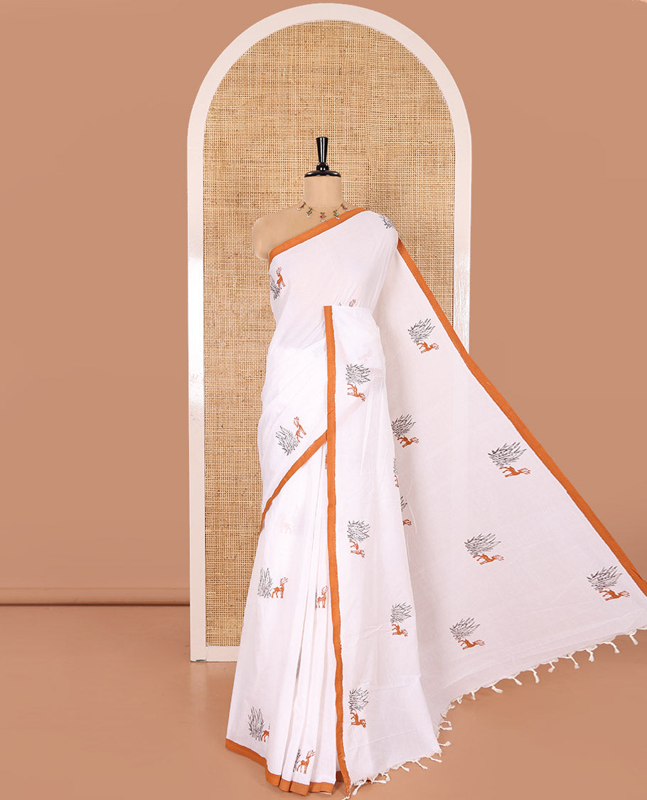 Cream South Cotton Saree Adorned with Deer Motifs Printed All Over Its Body, Complemented by a Contrast Plain Border, and Paired with a Contrast Floral Printed Blouse