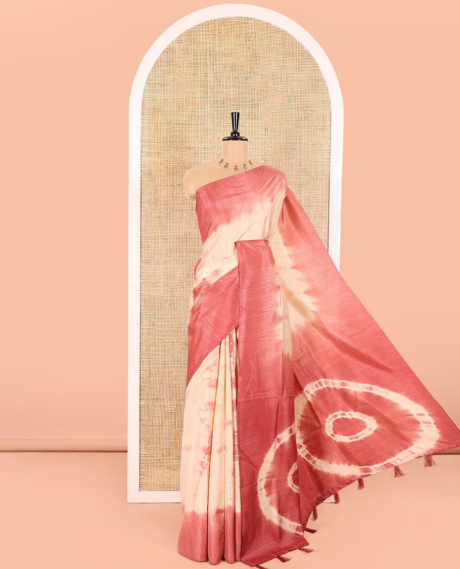 Cream and Onion Pink Jute Tussar Saree Subtly Adorned with Shibori Print, Captivating Contrast Border of Shibori Print, Pallu of the Same Shibori Print, and Comes with a Contrast Blouse