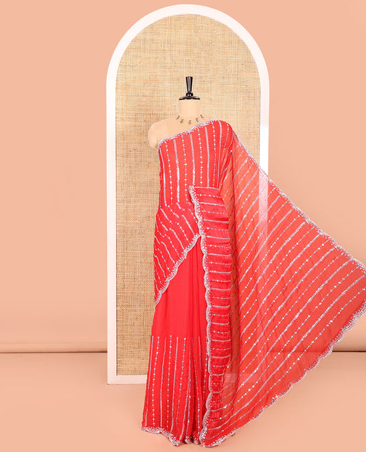 Red Fendy Chiffon Saree Highlighted with Sequins and Thread Stripes Embroidery, Scallop Embroidered Border, Elegantly Embroidered Pallu, and Paired with a Matching Blouse