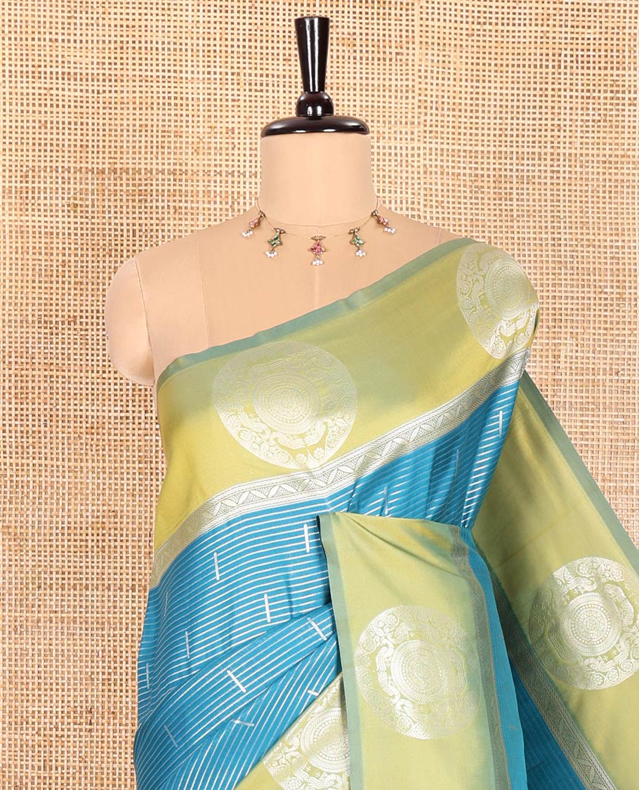 Rama Elite Soft Silk Saree Ornamented with Vaira Oosi and Zari Buttas All Over Its Body, Complemented by a Contrast Border Featuring Chakram Motifs, Subtly Sparkled Pallu, and Paired with a Contrast Blouse
