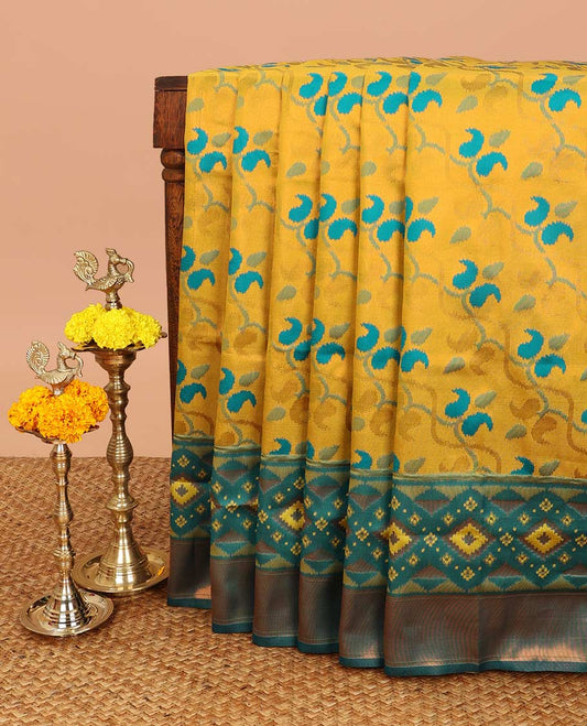 Mustard patola design litchi silk saree with contrast border & contrast pallu along with contrast blouse