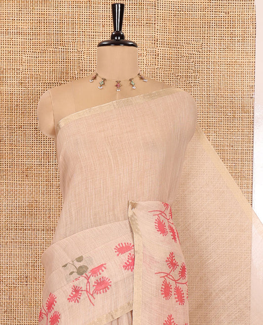 Chikku Linen Saree, Adorned with Floral Motifs Printed on Its Body, a Subtle Piping Border, Pallu Steeped with Floral Motifs and Stripes, and Paired with a Contrast Blouse