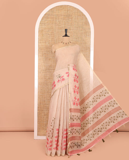 Chikku Linen Saree, Adorned with Floral Motifs Printed on Its Body, a Subtle Piping Border, Pallu Steeped with Floral Motifs and Stripes, and Paired with a Contrast Blouse
