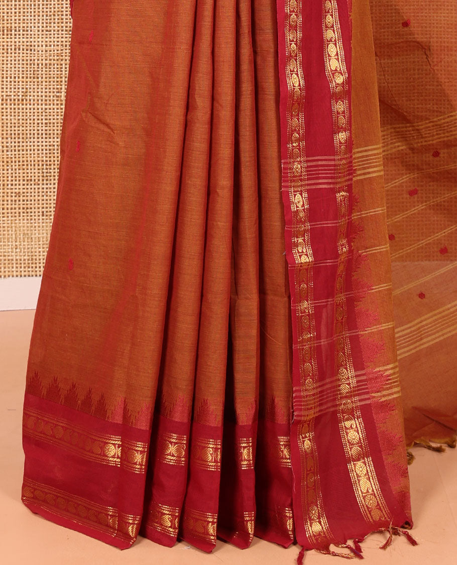 Honey Color Chettinad Cotton Saree, Adorned with Thread Buttas All Over Its Body, Complemented by a Contrast Temple Rettai Pettu Traditional Zari Design Border, Pallu of Stripes and Buttas, and Paired with a Matching Blouse