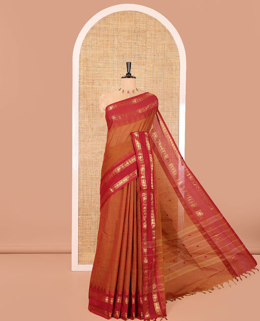 Honey Color Chettinad Cotton Saree, Adorned with Thread Buttas All Over Its Body, Complemented by a Contrast Temple Rettai Pettu Traditional Zari Design Border, Pallu of Stripes and Buttas, and Paired with a Matching Blouse