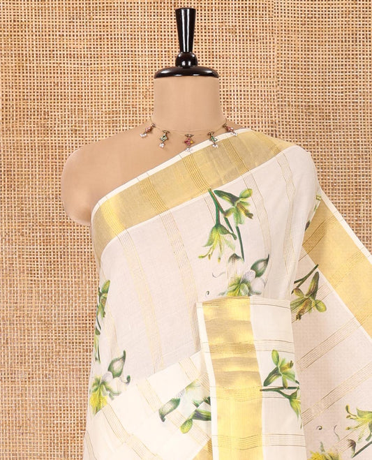 Half-White Kerala Cotton Saree, Prettified with Vertical Stripes and Floral Print on Its Body, Highlighted by a Zari Border, Pallu Pictures the Same Design, and Paired with a Matching Blouse