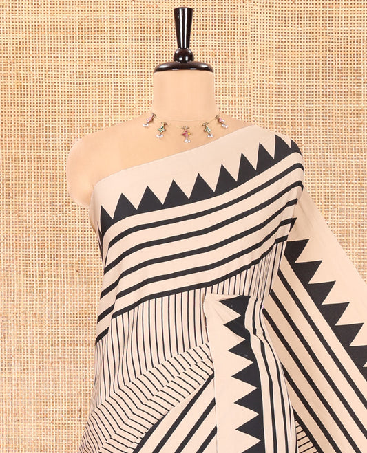 Chikku Satin Crepe Saree, Subtly Sparkled with Vertical Stripes On Its Body, Highlighted by Temple Border, Pallu Features Big Polka Dot Motifs, and Paired with a Printed Blouse