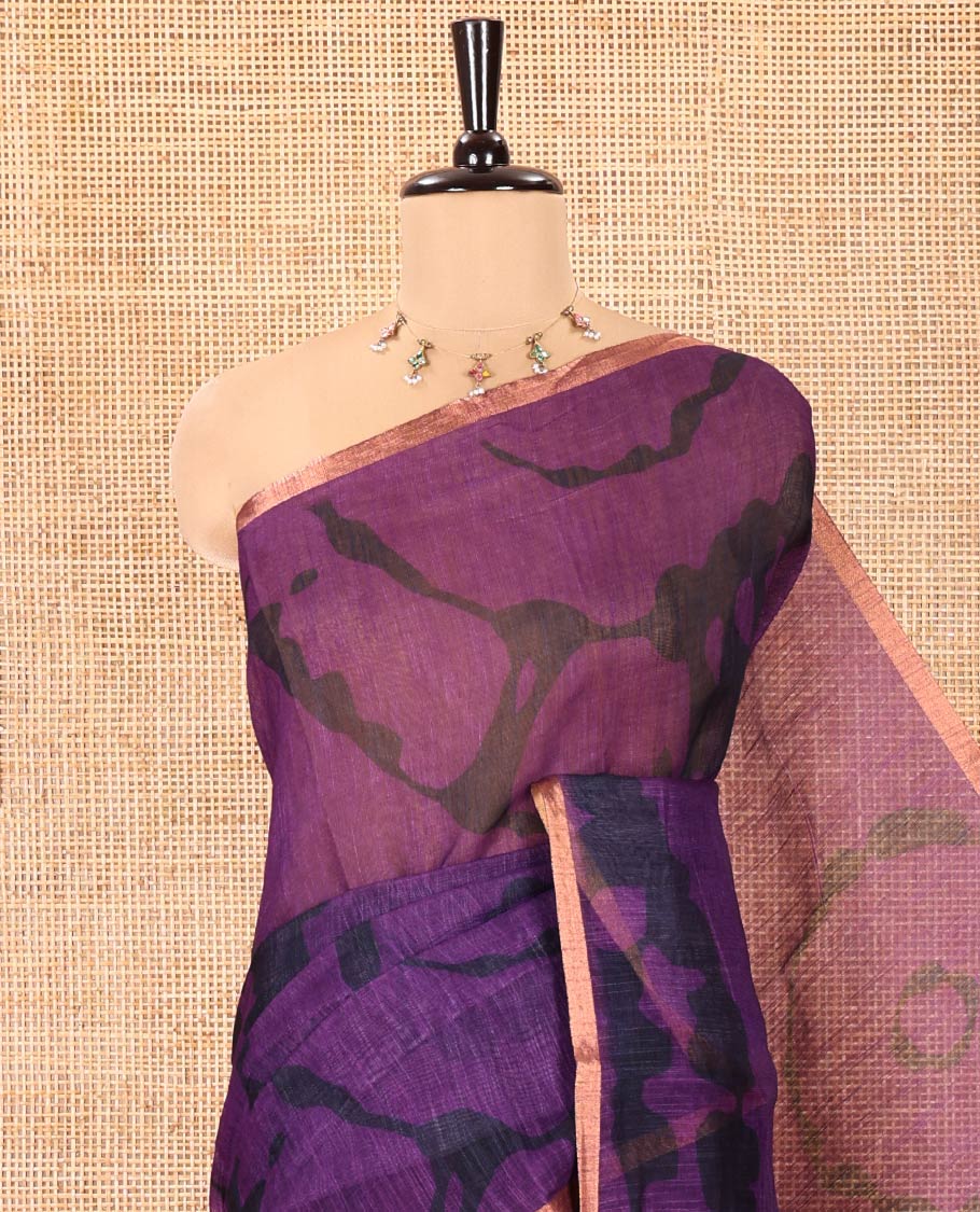 Purple Linen Cotton Saree, Elevated with Shibori Printed on Its Body, Subtle Piping Border, Pallu of Floral Vine Print, and Paired with a Contrast Floral Vine Printed Blouse