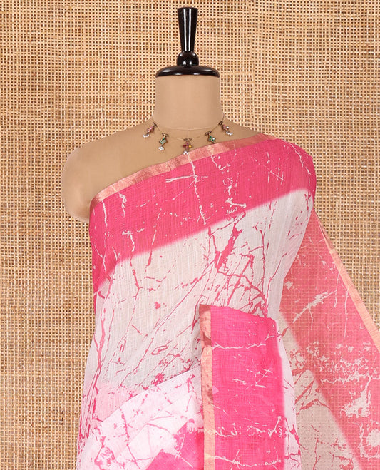 Cream and Pink Linen Cotton Saree, Decorated with Batik Print on Its Body, Complemented by Contrast Batik Printed Border, Pallu of Floral Print, and Paired with a Contrast Blouse