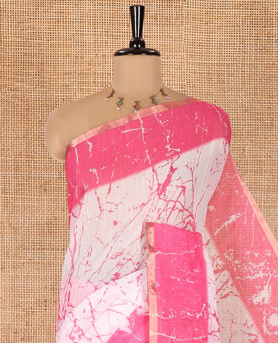 Cream and Pink Linen Cotton Saree, Decorated with Batik Print on Its Body, Complemented by Contrast Batik Printed Border, Pallu of Floral Print, and Paired with a Contrast Blouse