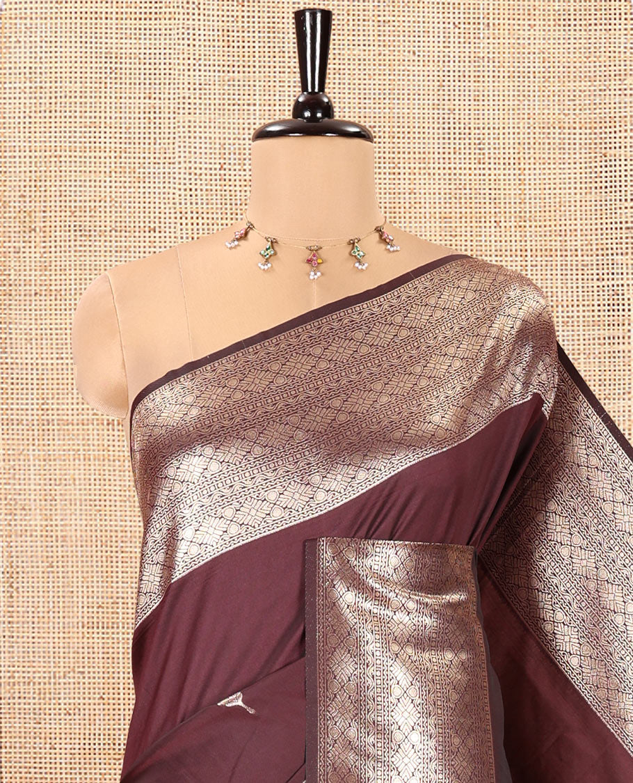 Brown Kanchi Soft Silk Saree, Delicately Woven with Zari Buttas All Over Its Body, Highlighted by Traditional Zari Design Border, Diagonally Striped Pallu, and Paired with a Matching Blouse