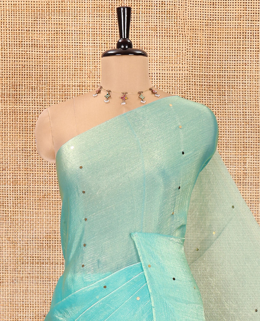 Borderless Sea Green Fendy Chiffon Saree, Gleamed Up with Sequin Work on Its Body, Highlighted by a Self-Pallu of Sequin Work, and Paired with a Matching Blouse