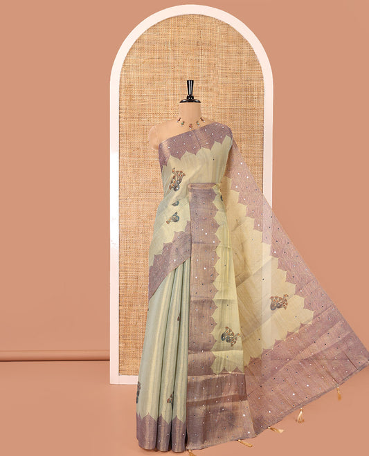 Blue Tissue Saree, Decorated with Floral Buttas and Mirrorwork, a Self-Border, Ogee Print Pallu, and a Matching Blouse