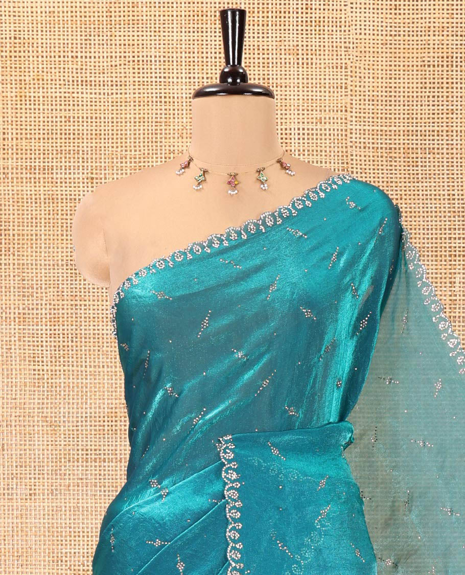 Blue Fendy Chiffon Saree, Highlighted by Swarovski Stone Work All Over the Body, Gleaming Swarovski Stone Work Border, a Self-Pallu, and Paired with a Fancy Designer Blouse