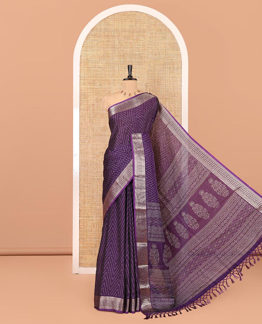 Violet Dola Silk Saree, Subtly Sparkled with Chevron Stripes on Its Body, Highlighted by Traditional Zari Design Border, Intricately Designed Pallu, and Paired with a Matching Blouse