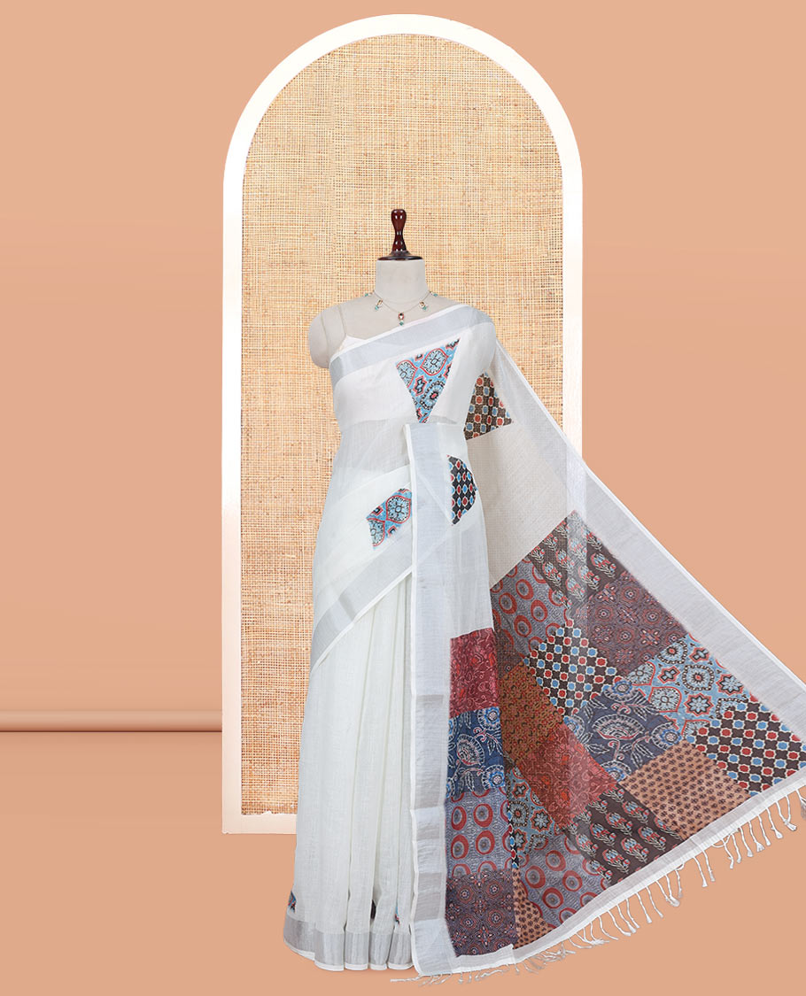 Cream Linen Cotton Saree, Gleamed Up with Triangle Motifs Print, a Zari Border, Printed Pallu, and a Contrast Blouse