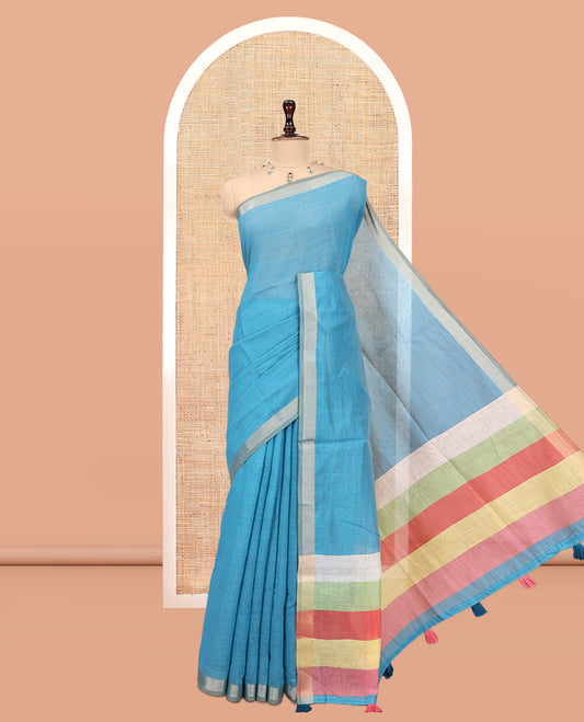 Blue Plain Semi-Tussar Saree, a Zari Border, Multi-Colored Striped Pallu, and a Contrast Blouse