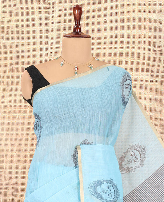 Borderless Blue Linen Cotton Saree, Beautified with Face Print, Contrast Pallu of Chevron Stripes and Face Print, a Contrast Blouse